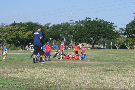 T's first awesome "tackle" that should have stopped at the flag coming off but T couldn't really get the flags off!