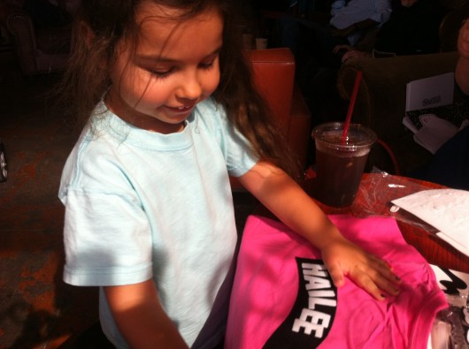 Colin and I met H, a four-year-old who was immediately drawn to playing with the Shout Out! T-shirt!