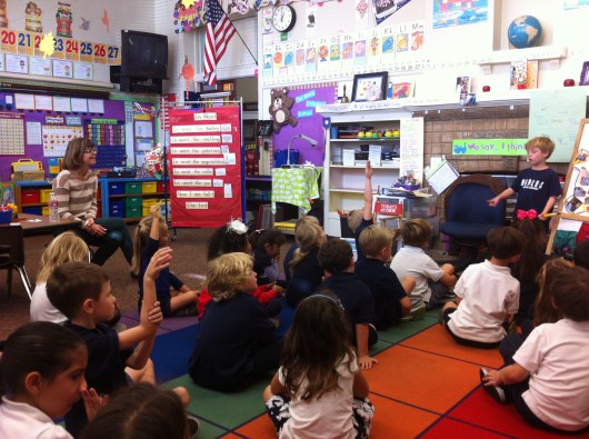 T takes questions from his class. He did great!