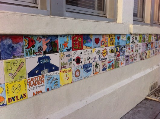 Just one small tiled section of the school's exterior walls where the finished tiles will become a permanent part of the community. Such a wonderful idea!