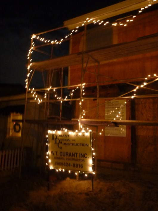 Even the lots being built on get into the holiday spirit down here!