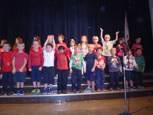 T's class and the other Kinders all sang a song based on a German drinking song, "Must Be Santa." Well, the school did claim the show was internationally focused. Cheers!