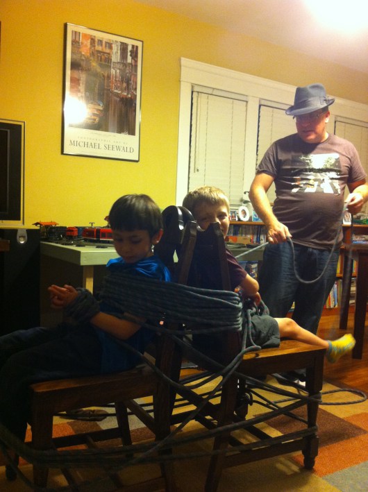 The boys wanted to be tied up like robbers. Well, OK then!