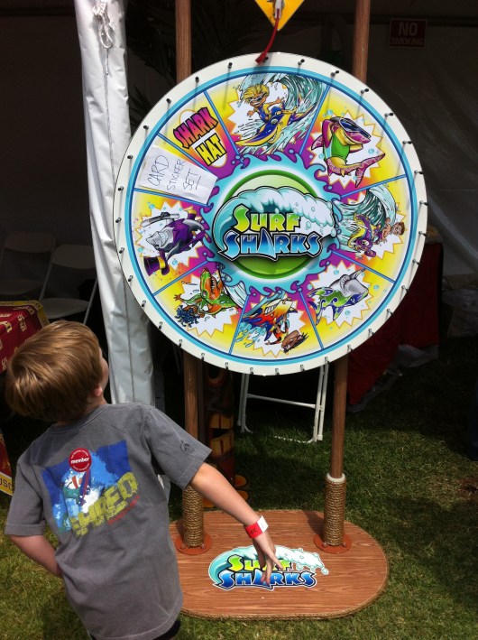 ... to spin this wheel... to win a bookmark. Not the best marketing ploy when the author noticed that people were leaving disappointed because they didn't get a shark hat. D'oh!
