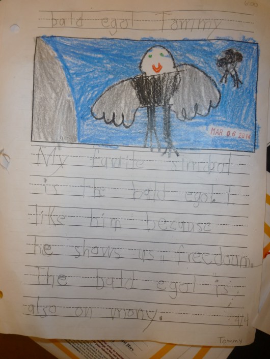 T's writing, "Bald Egol."