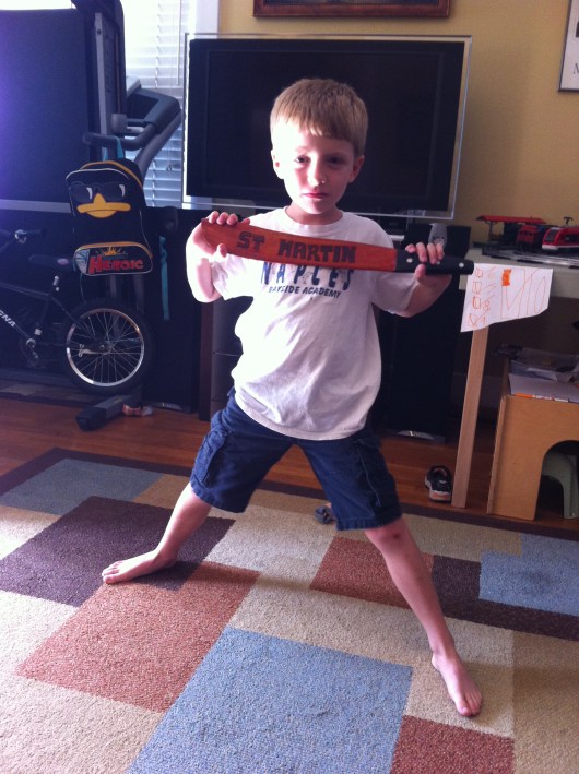 C and I went to St. Martin, and all T got was this wooden machete (and a t-shirt and conch shell, but this was the coolest souvenir.