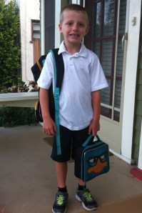 Traditional first day of school picture on the front porch (regular face).