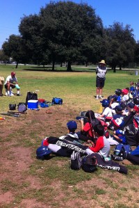 At the end of each day at Tom Hicks Baseball Camp, Grandpa re-distributes lost gear back to players.