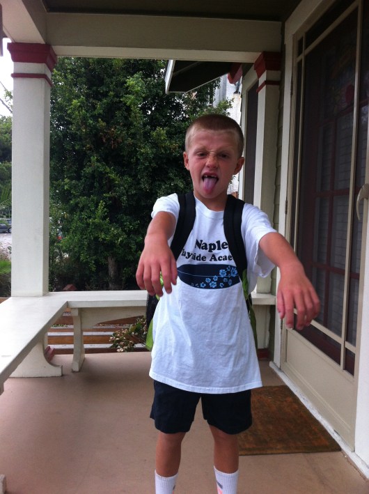 New traditional zombie first day of school photo on our front steps.