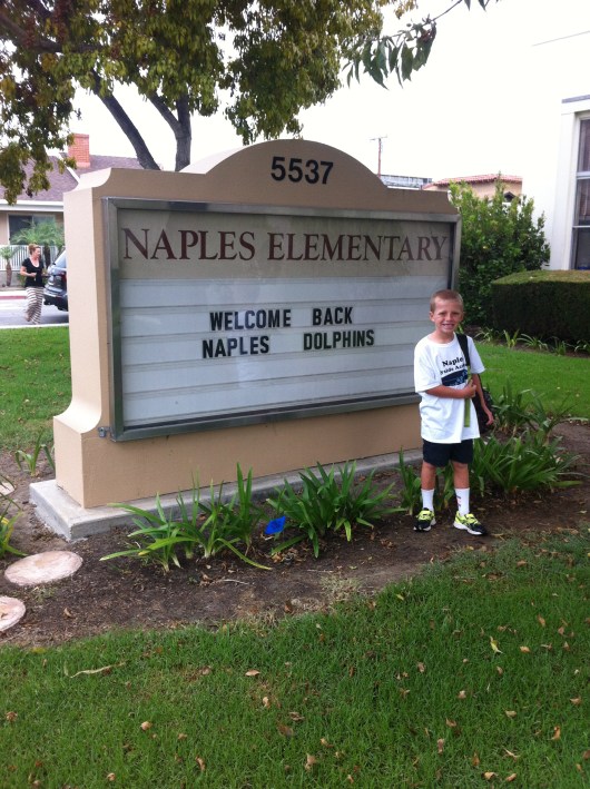 Fast-forward to school and our traditional first day of school photo in front of the school's marquee. We got there early to avoid the lines and crowds. Just sort-of kidding.