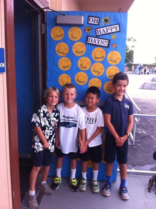 Now fast-forward to T's classroom door, which was all decorated up and ready for eager 2nd graders! T was happy to find many friends in his class this year (whew!).